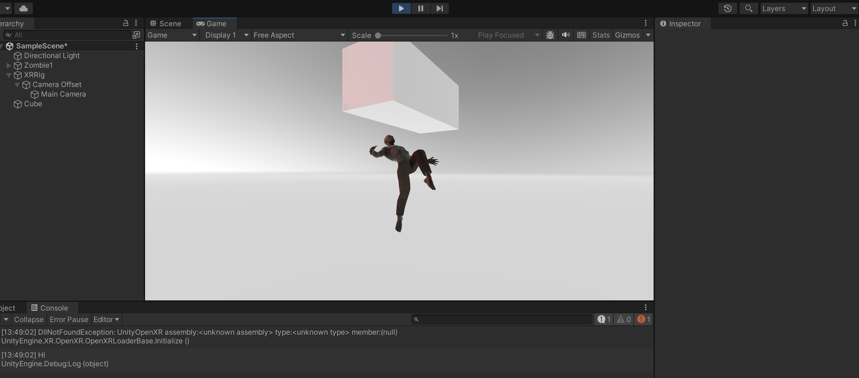 A screenshot taken from the Unity Engine. On the main scene, there is a depiction of a zombie hovering in the air in a position with its back arched. Above it is a plain white cube. Both the zombie and the cube are lightly illuminated in red. Below the scene, the console reads an error, followed by the output 'Hi'